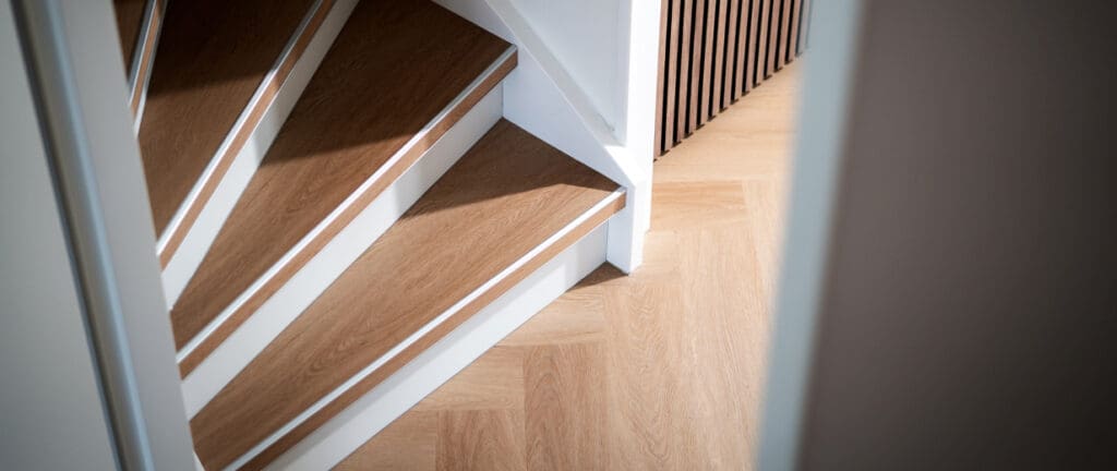 Houten traprenovatie met warme bekleding